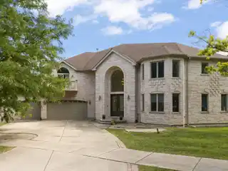 Distinguished North-Facing All-Brick Residence