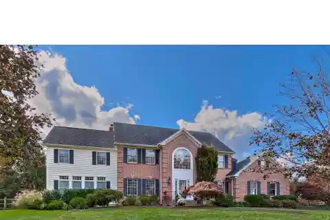 Exquisite six Bedroom Center Hall Colonial