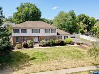 Black Oak Estates Gem with Four Bedrooms and Sunroom