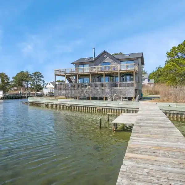 ELEGANT COASTAL RETREAT WITH PRIVATE DOCK ACCESS