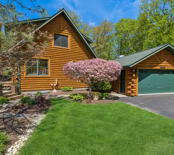 REFINED LUXURY IN THIS EXCEPTIONAL LOG HOME