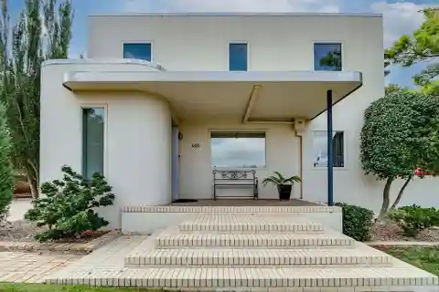 Streamline, Modern Home with Lush Backyard