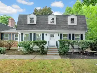 Wonderfully Upgraded Colonial in Ideal Location