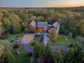 One-Of-A-Kind Stone and Glass Residence