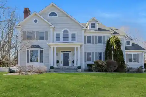 Amazing Center Hall Colonial on over Two Acres
