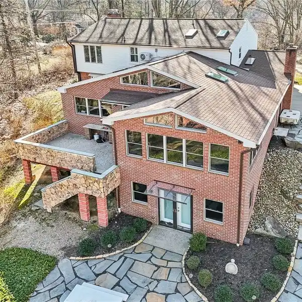 SKILLFULLY REDESIGNED AND EXPANDED RESIDENCE