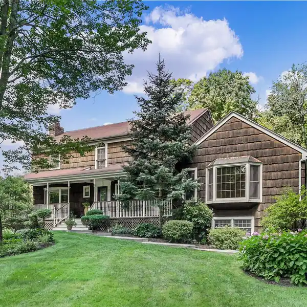 BEAUTIFUL COLONIAL ON NEARLY THREE PARK-LIKE ACRES