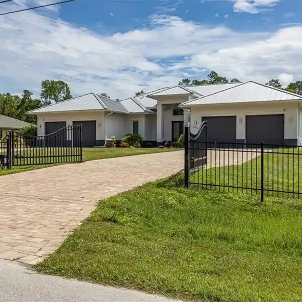 VERSATILE MULTI-GENERATIONAL HOME WITH HEATED LAP POOL