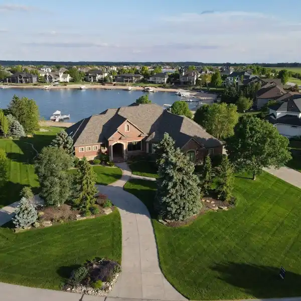 ELEGANT LAKEFRONT RANCH WITH PRIVATE SANDY BEACH