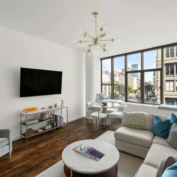 SOPHISTICATED SOHO CONDO WITH WILLIAMSBURG BRIDGE VIEWS