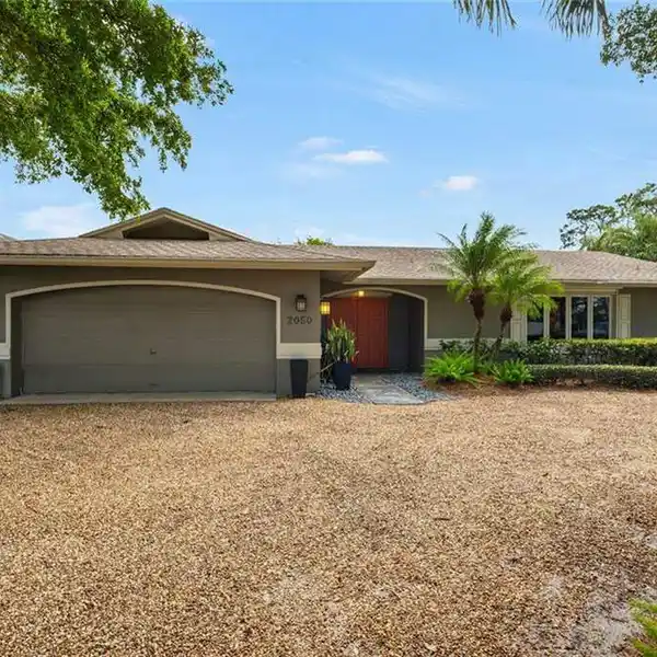 ONE-OF-A-KIND RANCH HOME HIDDEN BEHIND THE TREES