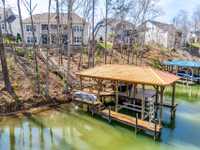 METICULOUSLY CRAFTED LAKEFRONT RETREAT
