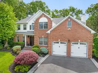 Outstanding Brick Front Center Hall Colonial