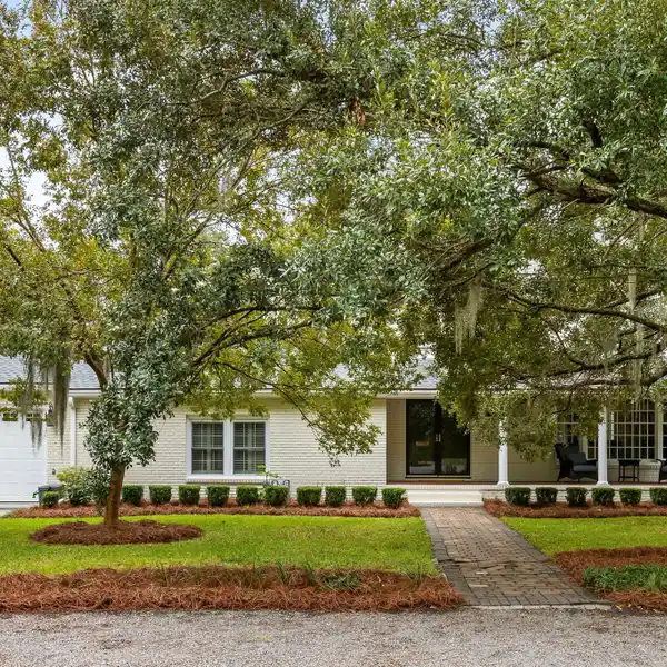 SOPHISTICATED LAKEFRONT LIVING WITH SUNLIT INTERIORS & SCENIC VIEWS