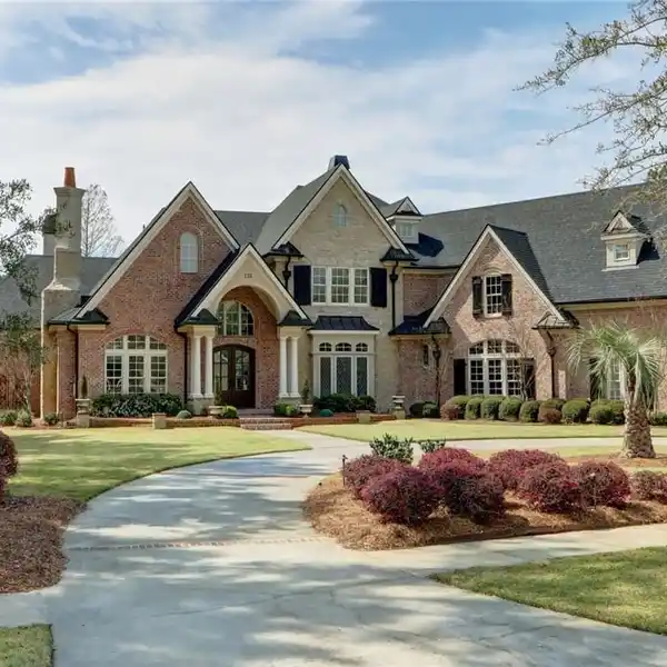 IMPOSING TUDOR REVIVAL MINI-ESTATE