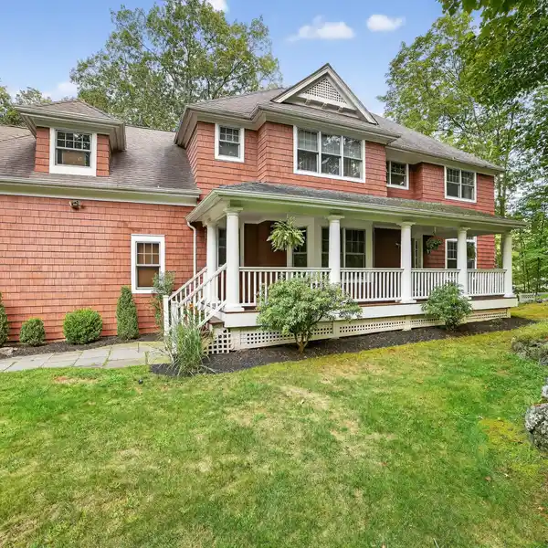 STUNNING FRONT PORCH CENTER HALL COLONIAL