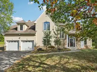 Beautifully Maintained Colonial Home on a Large Lot