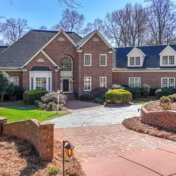 SPECTACULAR ALL-BRICK HOME ON THE GOLF COURSE AT SEDGEFIELD COUNTRY CLUB