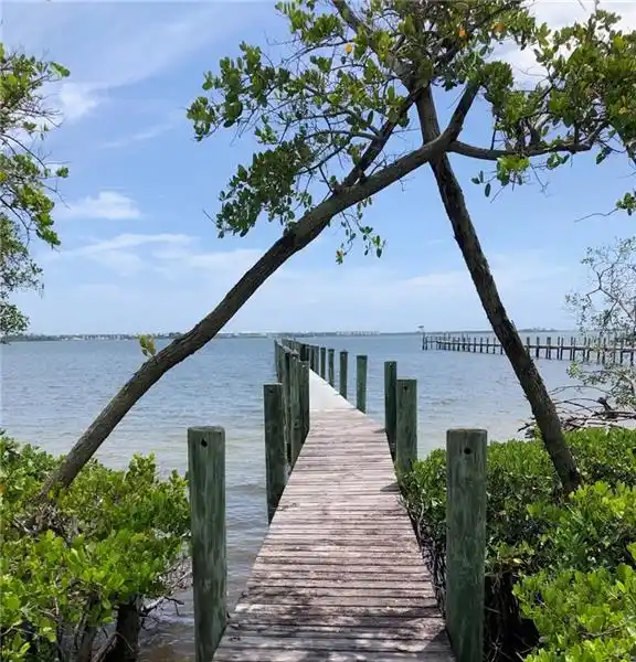 EXPANSIVE INDIAN RIVERFRONT LOT WITH PRIVATE DOCK