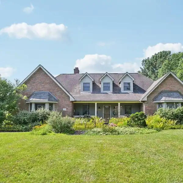 CUSTOM CAPE COD HOME WITH INCREDIBLE AMENITIES