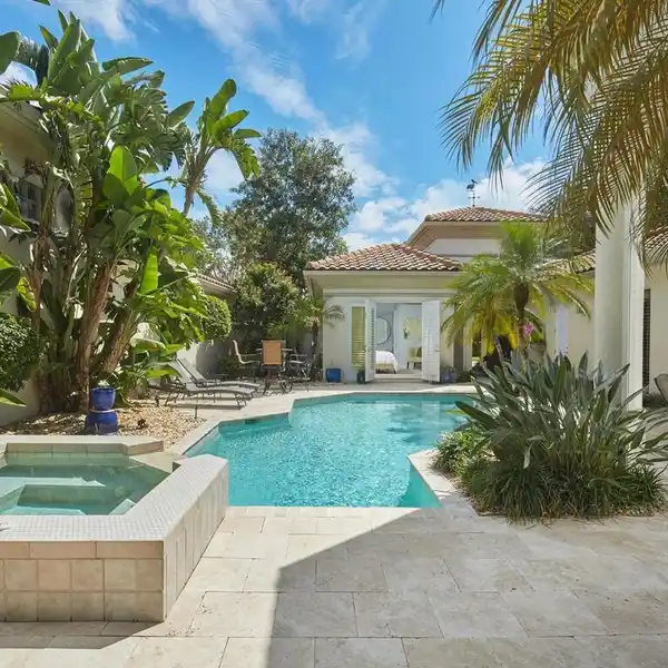 LUXURY COURTYARD HOME TUCKED WITHIN EXCLUSIVE GATE