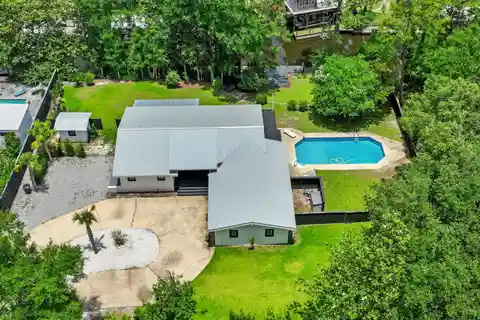 Extraordinary Canal-Front Sanctuary Set on a Rare Double Lot