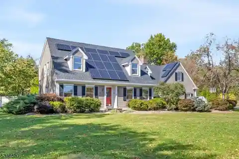 Beautifully Maintained Custom Cape Cod Home