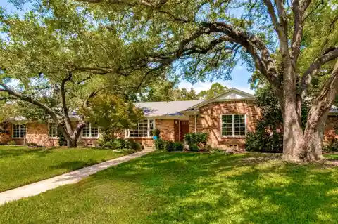 Classic Design Meets Modern Comfort on Landscaped Lot
