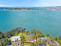 EXCEPTIONAL PROPERTY ABOVE THE GLENDOWIE WATERFRONT