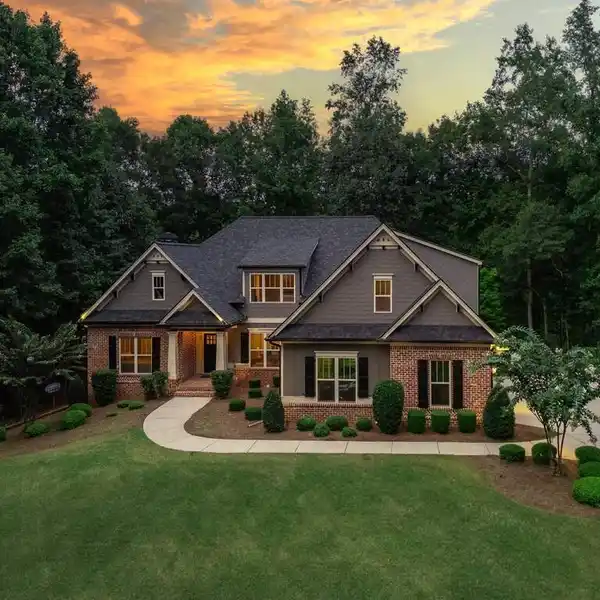 STUNNING LAKEFRONT HOME WITH ELEGANT OPEN CONCEPT