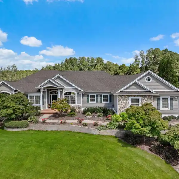 BUILDER'S HOME ON NEARLY THREE ACRES IN OLD MISSION ESTATES