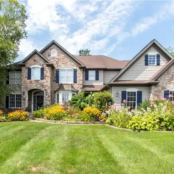 CUSTOM COLONIAL HOME IN THE PRESTIGIOUS BLUE HERON ESTATES
