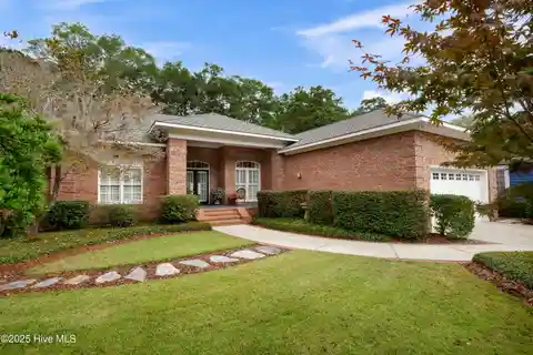 Timeless Brick Estate Blending Elegance and Modern Comfort