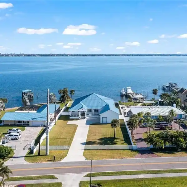 NEW CUSTOM RIVERFRONT DREAM HOME