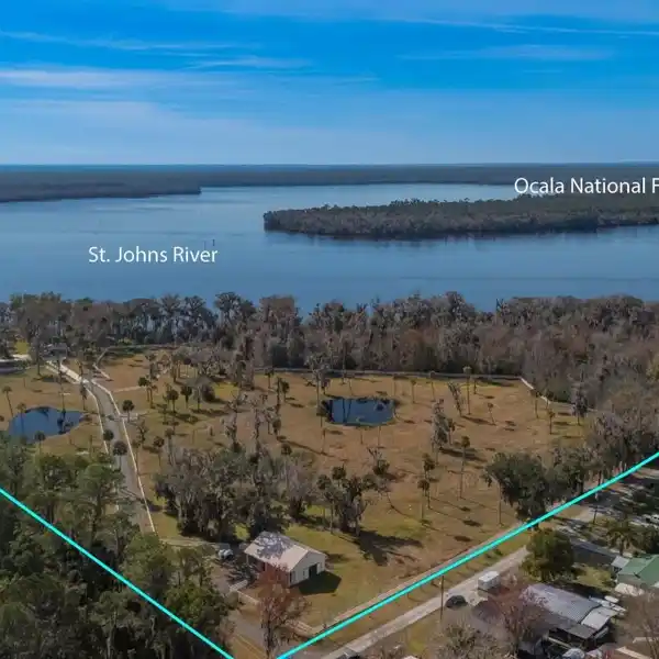 GORGEOUS HOME ON 22 AMAZING RIVERFRONT ACRES