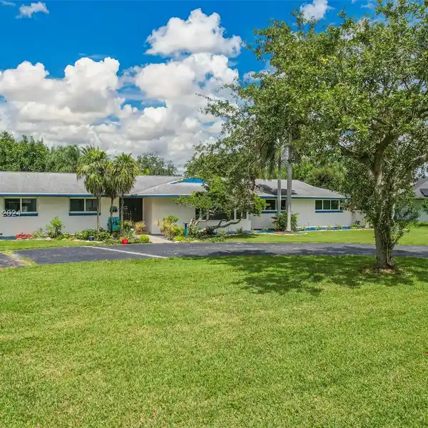 THOUGHTFULLY UPGRADED ESTATE HOME ON OVER AN ACRE
