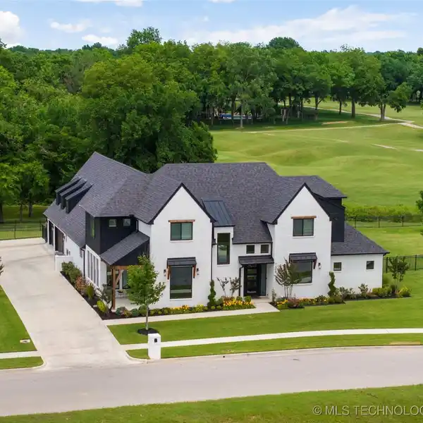 UPSCALE HOME WITH STUNNING YEAR-ROUND OUTDOOR SPACES