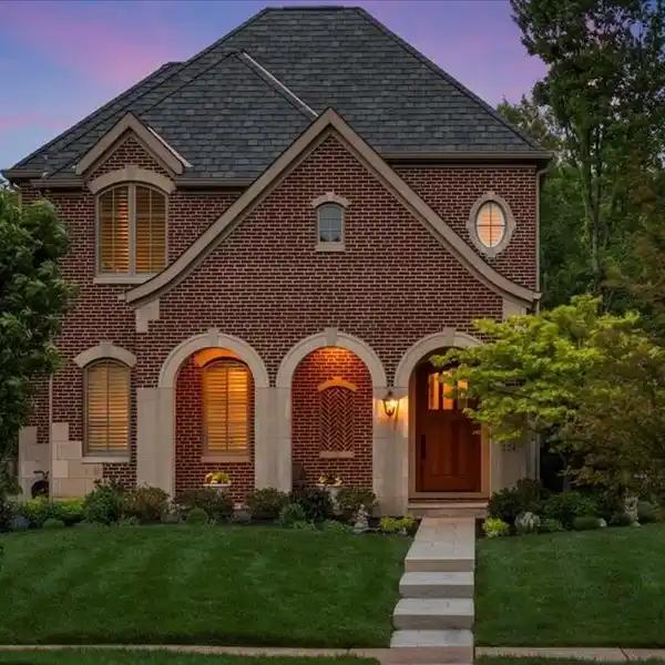 NEWER BRICK AND LIMESTONE HOME WITH TIMELESS CHARM