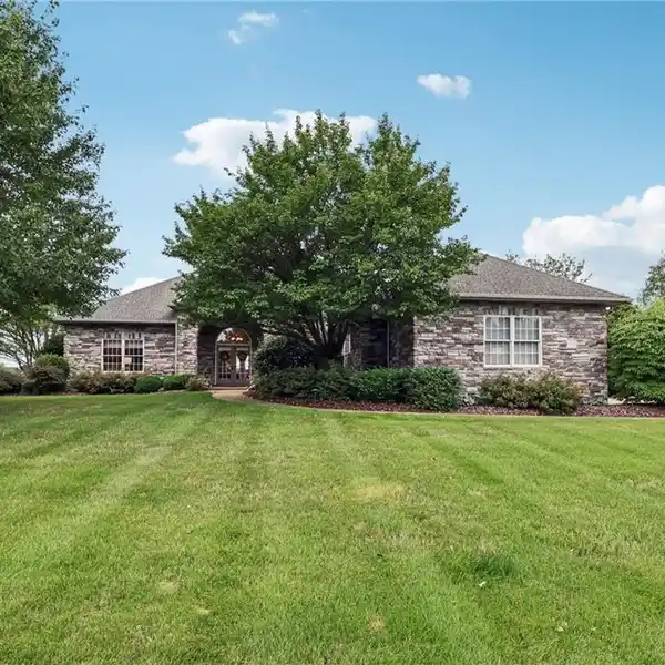 IMPECCABLE HOME IS COMPLIMENTED WITH CUSTOM AMENITIES