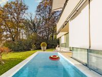 LUXURIOUS RESIDENCE WITH POOL AND PRIVATE GARAGE