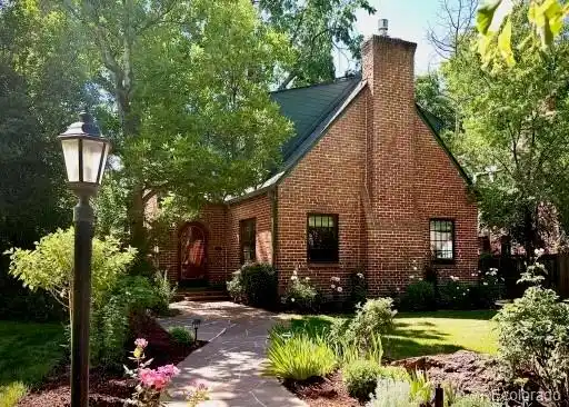 CHARMING TUDOR HOME SITUATED ON A PICTURESQUE HILLTOP STREET