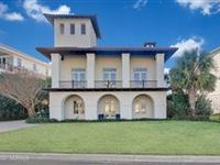 EXCEPTIONALLY CONSTRUCTED COASTAL MEDITERRANEAN-STYLE HOME
