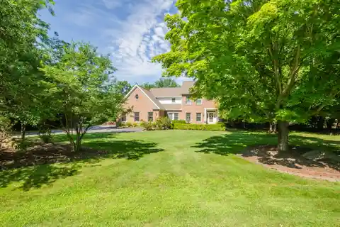 Architecturally Designed Custom Home on a Lush Acre-plus