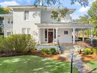 STATELY STUCCO HOME ON A LARGE CORNER LOT