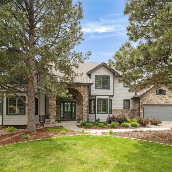 COMFORTABLE LIVING IN A PRIVATE WOODED SETTING