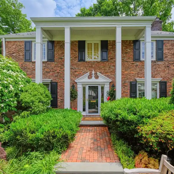 ELEGANT BRICK CENTER HALL COLONIAL