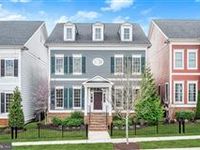 CHARMING DESIGNER COLONIAL IN SOUGHT-AFTER MAPLE LAWN
