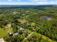WONDERFUL NEW HOME ON TEN ACRES IN JUPITER FARMS