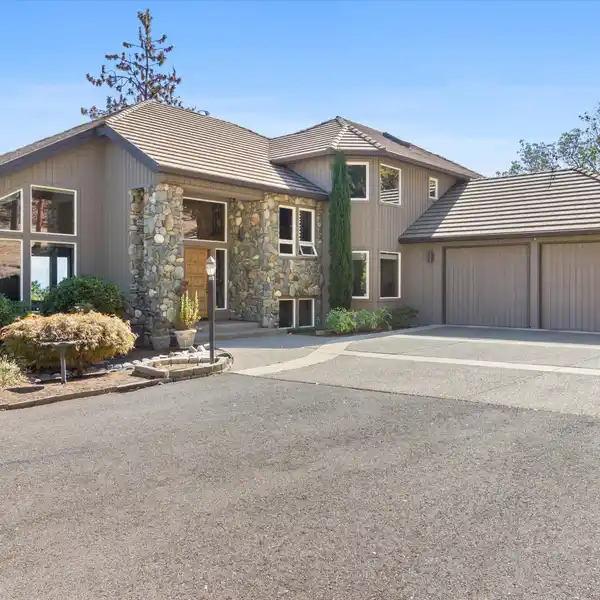 METICULOUSLY CARED FOR HOME ON OVER TEN ACRES