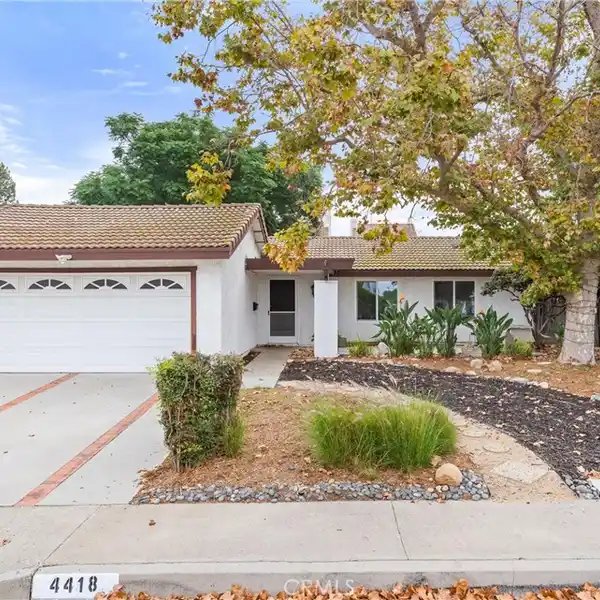 INVITING FAMILY HOME WITH SCENIC HILL VIEWS